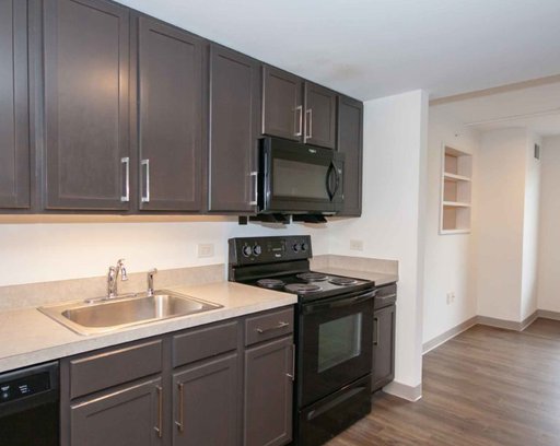 Residence kitchen at 10th and Juniper Apartments